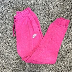 Nike Pink Sweatpants with Tapered Leg Design